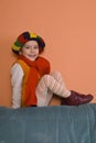 Little Girl in orange dress posing