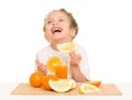 Little girl with oranges drink juice Royalty Free Stock Photo