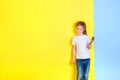 A little girl with a paint brush in her hands Royalty Free Stock Photo