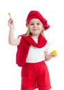 Little girl with paintbrush in artist costume Royalty Free Stock Photo