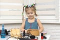 Little girl is painted with mother s makeup Royalty Free Stock Photo