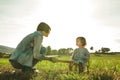 Girl painting on a blackboard. Girl playing in the field