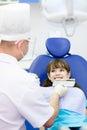 Little girl with palette for tooth color