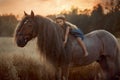 Little girl with palomino miniature horse in summer day Royalty Free Stock Photo