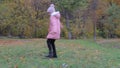 Little girl in park autumn . Adorable Little Girl Smiles.