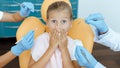 Little girl, patient visits specialist in dental clinic