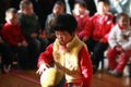 Little girl patting ball Royalty Free Stock Photo