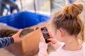 Little girl photographing baby crocodile Royalty Free Stock Photo