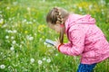 Little girl photographing with her smartphone Royalty Free Stock Photo