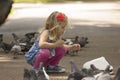 Little girl and pigeons Royalty Free Stock Photo