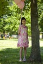 Little girl with pink balllons Royalty Free Stock Photo