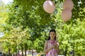 Little girl with pink balllons Royalty Free Stock Photo