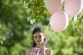 Little girl with pink balllons Royalty Free Stock Photo