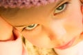 Little Girl in Pink Crochet Hat Close Up Royalty Free Stock Photo