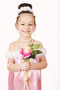 Little girl in pink dress with flowers Royalty Free Stock Photo