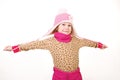 Little girl in a pink hat with arms outstretched Royalty Free Stock Photo