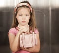 Little girl with pink purse