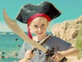 Little girl in pirate costume.