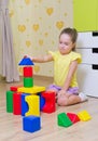 Little girl with plastic cubes