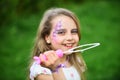 Little girl play with bubble blower Royalty Free Stock Photo