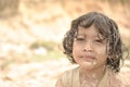 Little girl play with mud