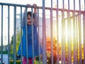 Little girl play on playground at sunset Royalty Free Stock Photo