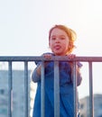 Little girl play on playground with white blur park background Royalty Free Stock Photo