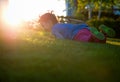 Little girl play on playground with white blur park background Royalty Free Stock Photo