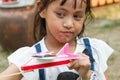 Little girl play toy airplane