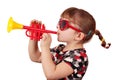 Little girl play trumpet