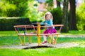 Little girl on a playground Royalty Free Stock Photo