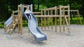 Little girl on a playground. Child playing outdoors in summer. Kids play on school yard. Royalty Free Stock Photo