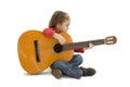 Little girl playing acoustic guitar Royalty Free Stock Photo