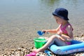 Little girl playing at the beach Royalty Free Stock Photo