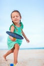 Little girl playing beach tennis Royalty Free Stock Photo
