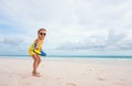Little girl playing beach tennis Royalty Free Stock Photo