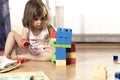 Little Girl Playing With Block Toys