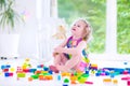 Little girl playing with blocks Royalty Free Stock Photo