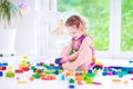 Little girl playing with blocks Royalty Free Stock Photo