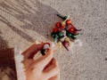 Little girl playing with bombs, colorful firecrackers