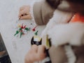 Little girl playing with bombs, colorful firecrackers