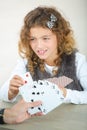 Little girl playing cards Royalty Free Stock Photo