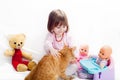 Little girl playing with cat Royalty Free Stock Photo