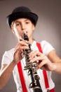 Little girl playing clarinet Royalty Free Stock Photo