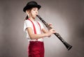 Little girl playing clarinet Royalty Free Stock Photo