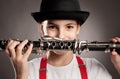 Little girl playing clarinet Royalty Free Stock Photo