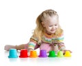 Little girl playing with color toys Royalty Free Stock Photo