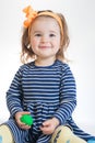 Little girl playing with colored plasticine isolated on the white background Royalty Free Stock Photo