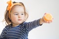 Little girl playing with colored plasticine isolated on the white background Royalty Free Stock Photo