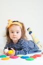 Little girl playing with colored plasticine isolated on the white background Royalty Free Stock Photo